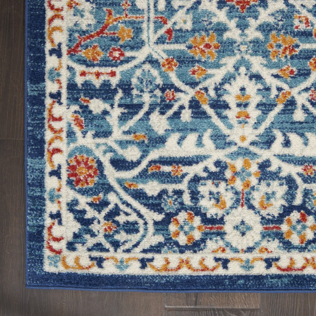 5' X 7' Blue And Ivory Floral Power Loom Area Rug