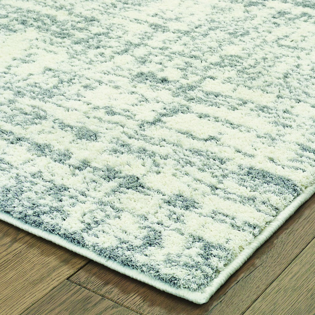 7’X10’ Ivory And Gray Abstract Strokes Area Rug