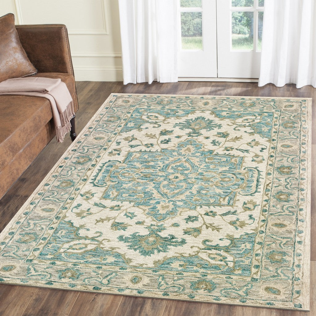 5’ x 8’ Turquoise and Cream Medallion Area Rug