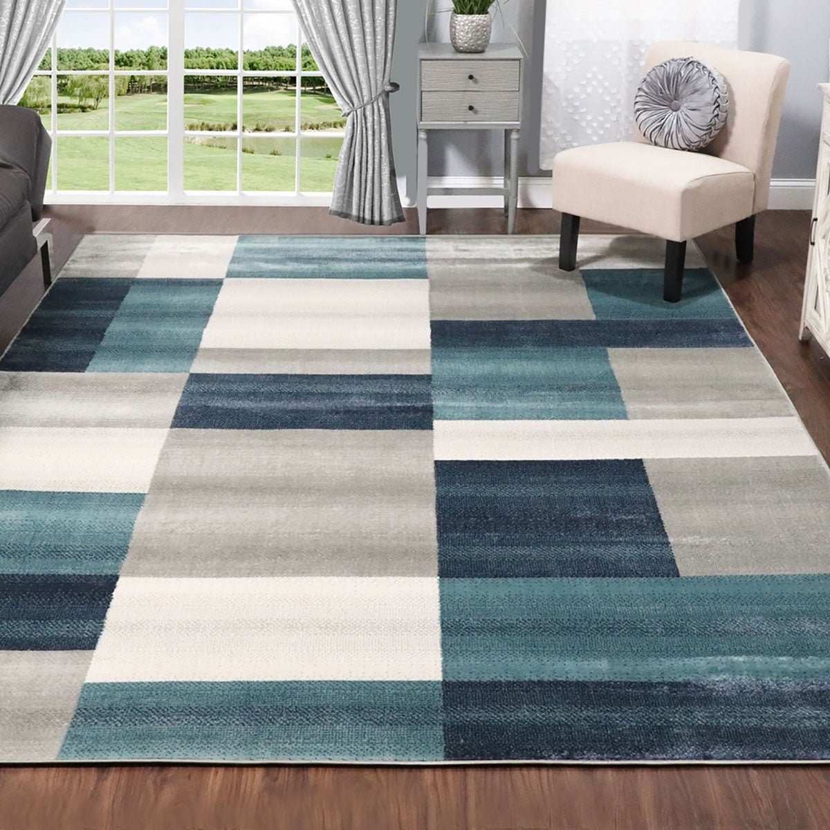 5' X 8' Teal And Gray Patchwork Power Loom Stain Resistant Area Rug