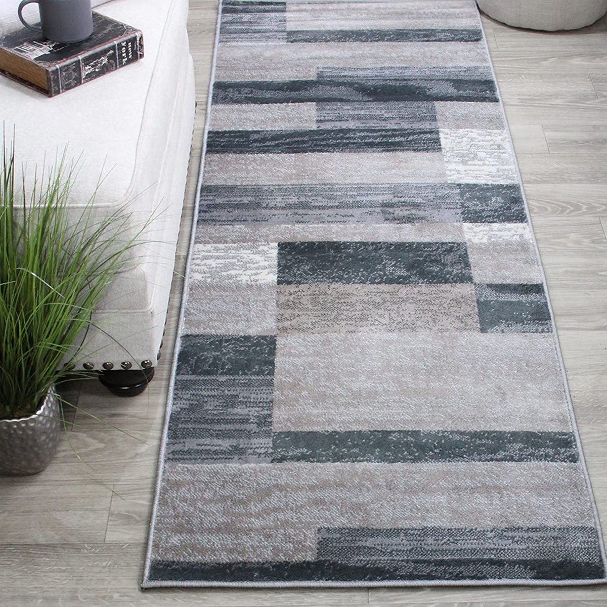 8' Blue And Taupe Patchwork Power Loom Stain Resistant Runner Rug