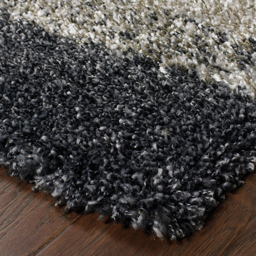 6' X 9' Charcoal Silver And Grey Geometric Shag Power Loom Stain Resistant Area Rug