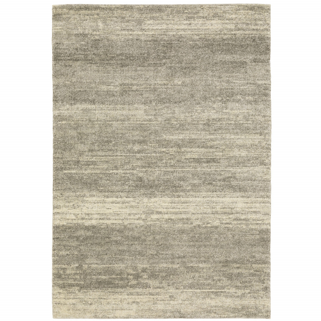 5' X 8' Grey Beige And Tan Abstract Power Loom Stain Resistant Area Rug