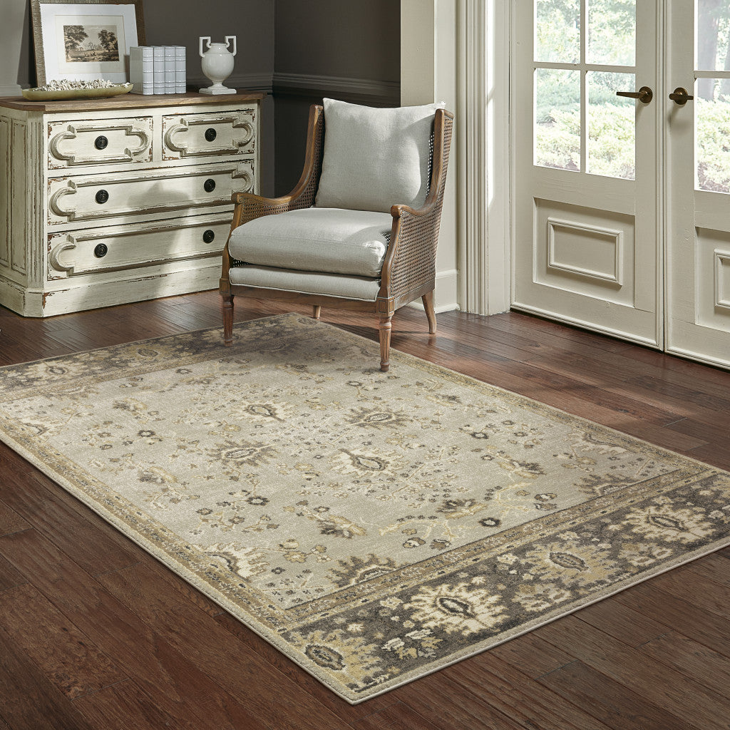 10' X 13' Grey Brown Tan And Beige Oriental Power Loom Stain Resistant Area Rug