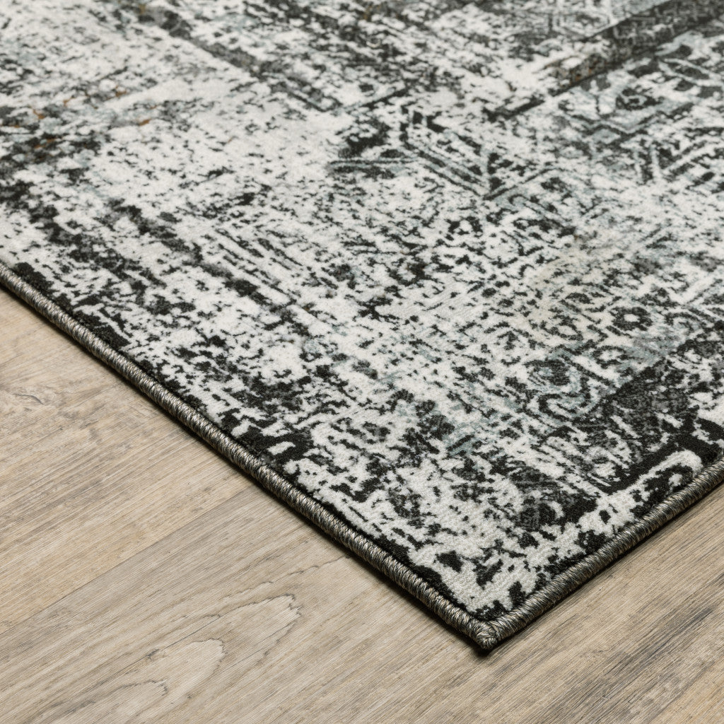 5' X 8' Charcoal Rust Grey Blue Ivory And Brown Oriental Power Loom Stain Resistant Area Rug