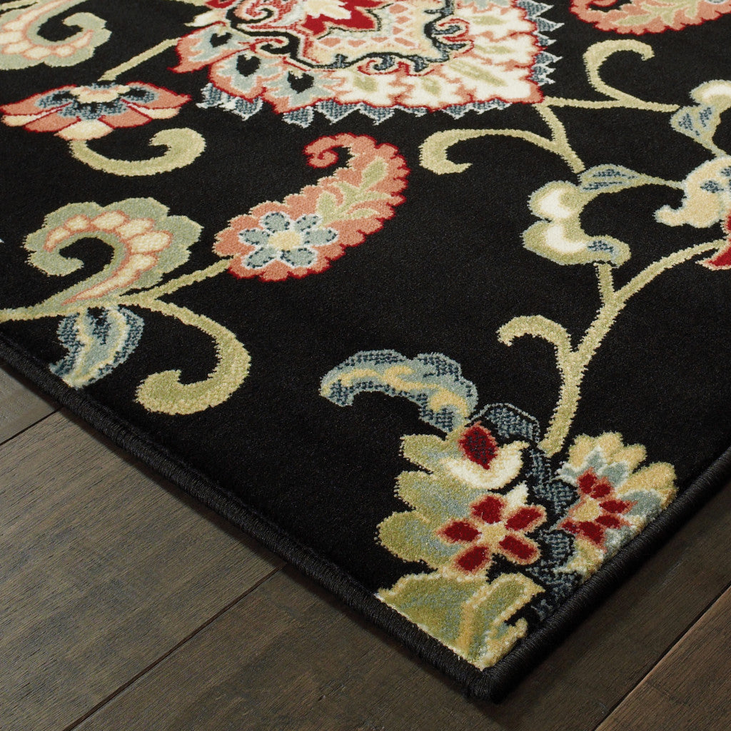 5' X 8' Black Red Green Ivory Salmon And Yellow Floral Power Loom Stain Resistant Area Rug