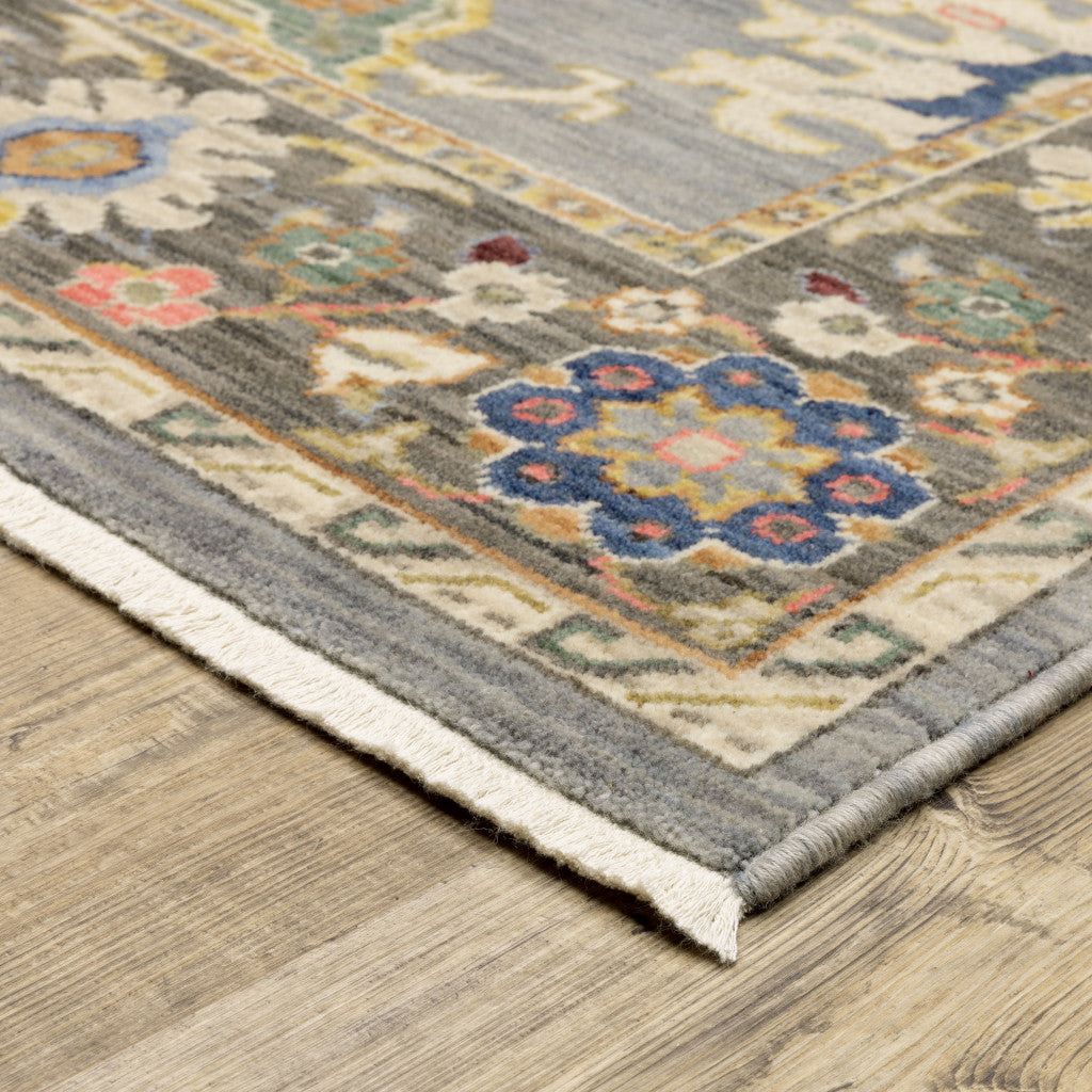 8' X 11' Blue Grey Gold Green Pink Orange Ivory And Red Oriental Power Loom Stain Resistant Area Rug With Fringe