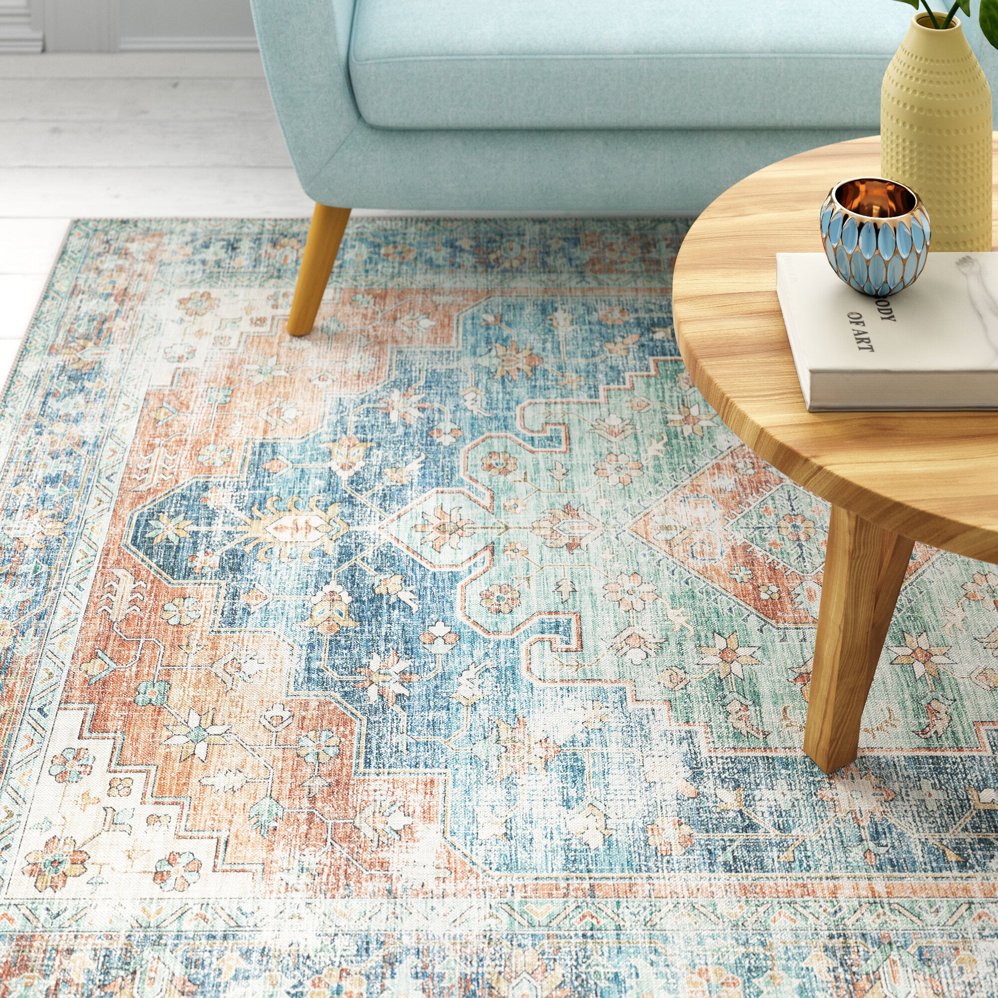 5' X 7' Orange Blue Teal Green And Beige Oriental Power Loom Stain Resistant Area Rug