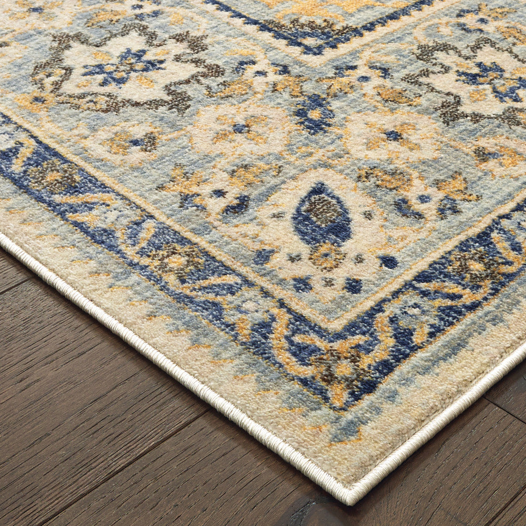 6' X 9' Ivory And Blue Oriental Power Loom Stain Resistant Area Rug