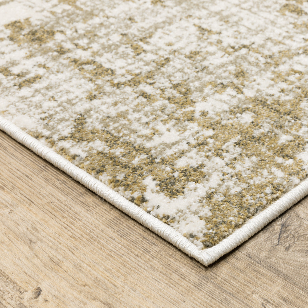 6' X 9' Beige Gold And Grey Abstract Power Loom Stain Resistant Area Rug