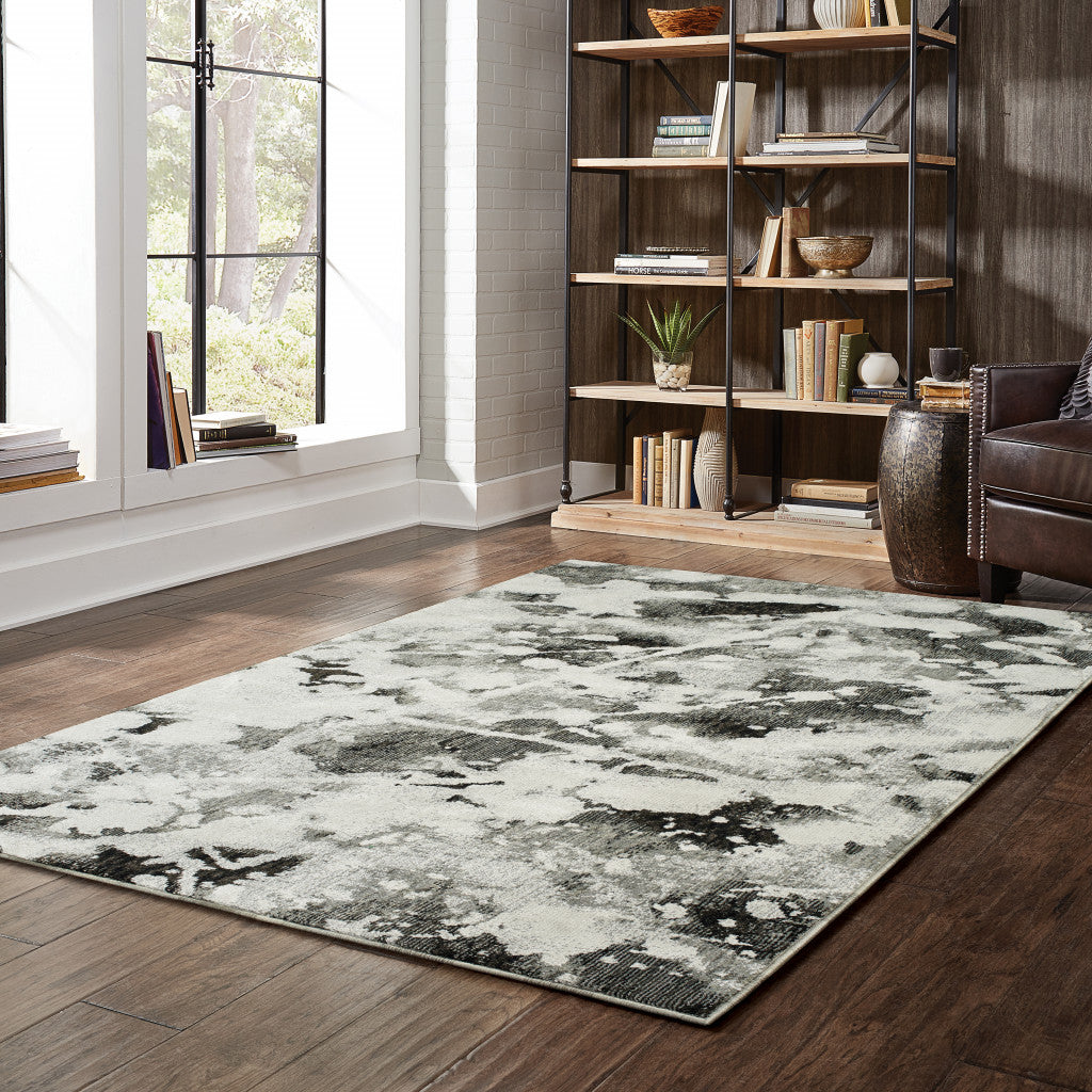 5' X 7' Charcoal And White Abstract Power Loom Stain Resistant Area Rug