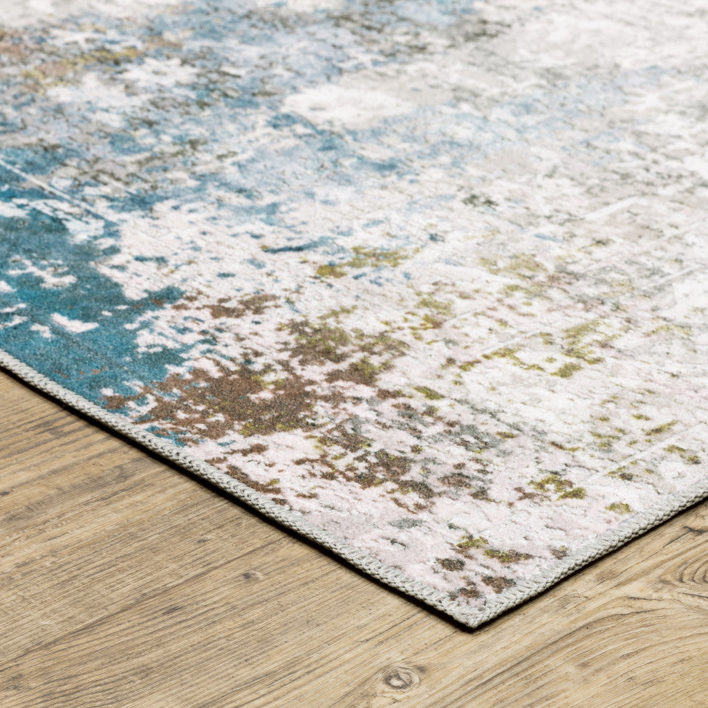 8' X 10' Ivory Teal Blue Grey Brown And Gold Abstract Printed Stain Resistant Non Skid Area Rug