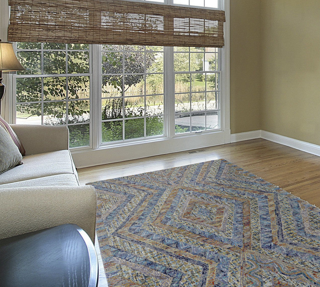 5' X 8' Blue Brown And Orange Wool Geometric Tufted Handmade Stain Resistant Area Rug