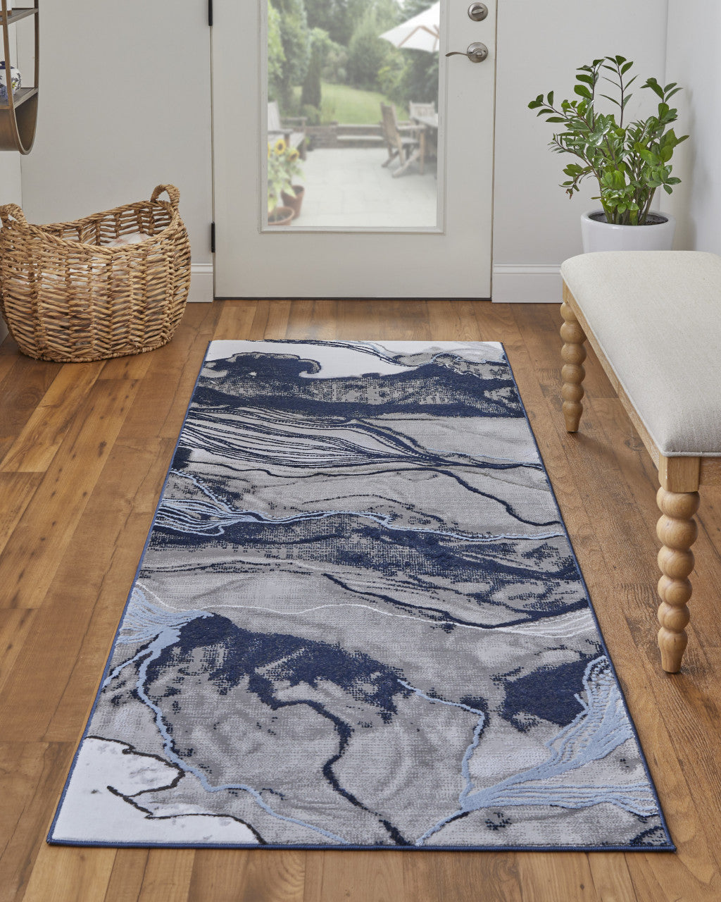 7' X 10' Blue Gray And Ivory Abstract Power Loom Stain Resistant Area Rug