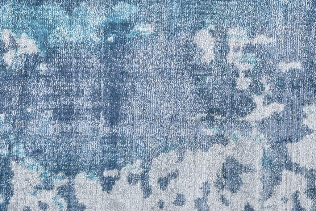 8' X 10' Blue And Ivory Abstract Hand Woven Area Rug