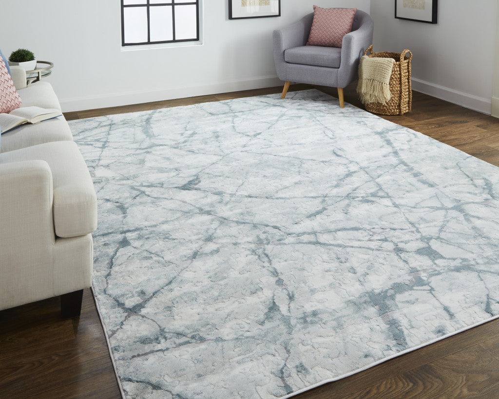 8' X 10' Blue Gray And Ivory Abstract Distressed Stain Resistant Area Rug