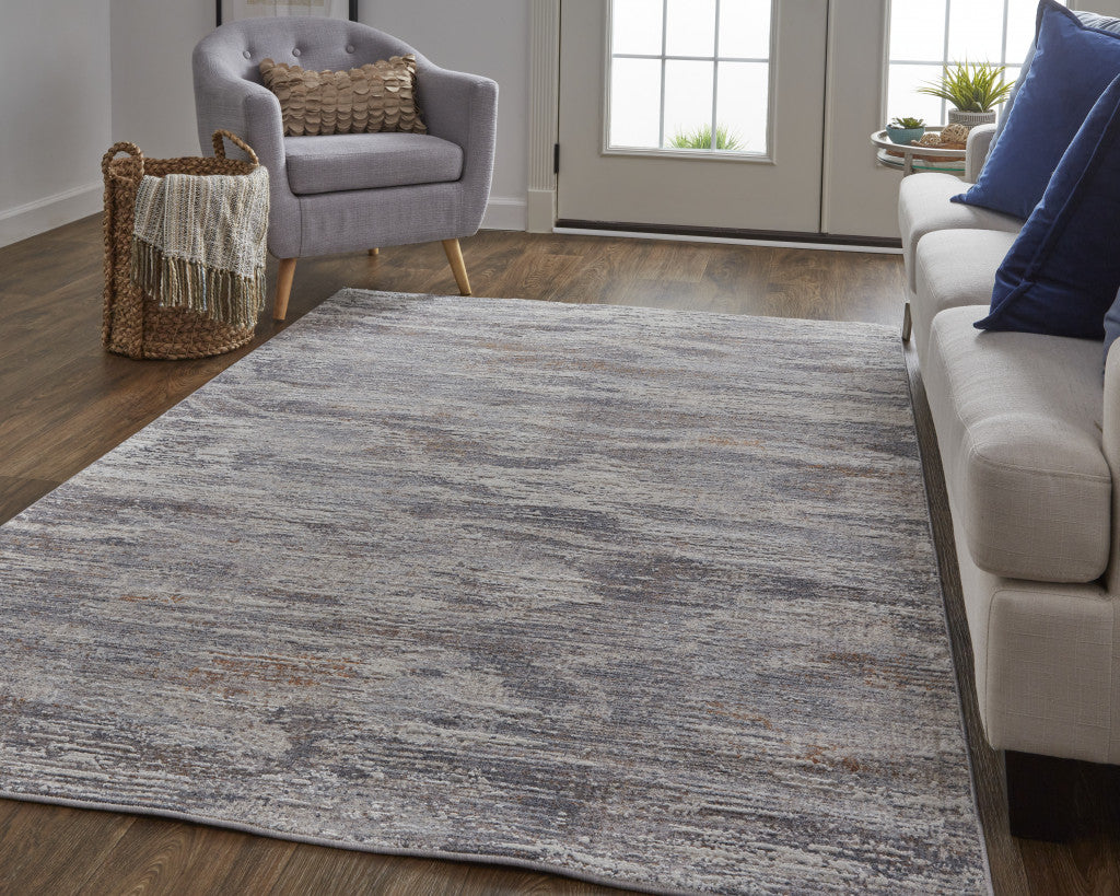 8' X 10' Tan Taupe And Gray Abstract Power Loom Distressed Stain Resistant Area Rug