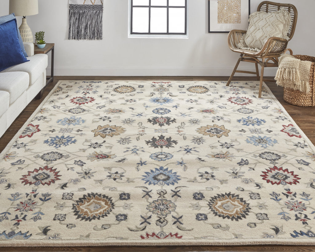 5' X 8' Ivory Blue And Tan Wool Floral Tufted Handmade Stain Resistant Area Rug