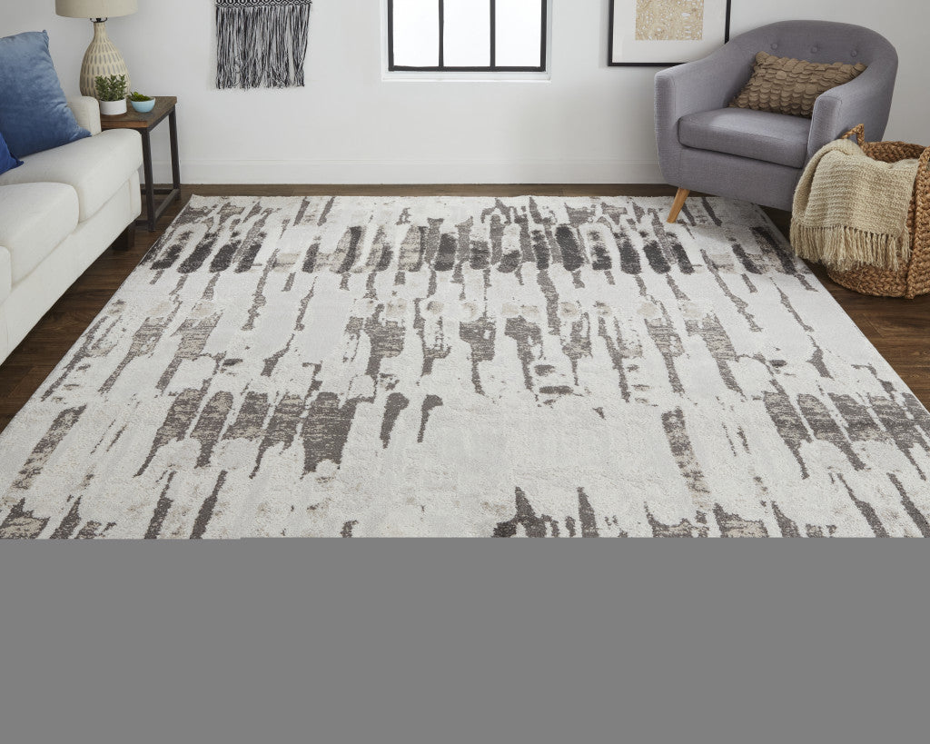 2' X 3' Ivory Brown And Gray Abstract Power Loom Stain Resistant Area Rug