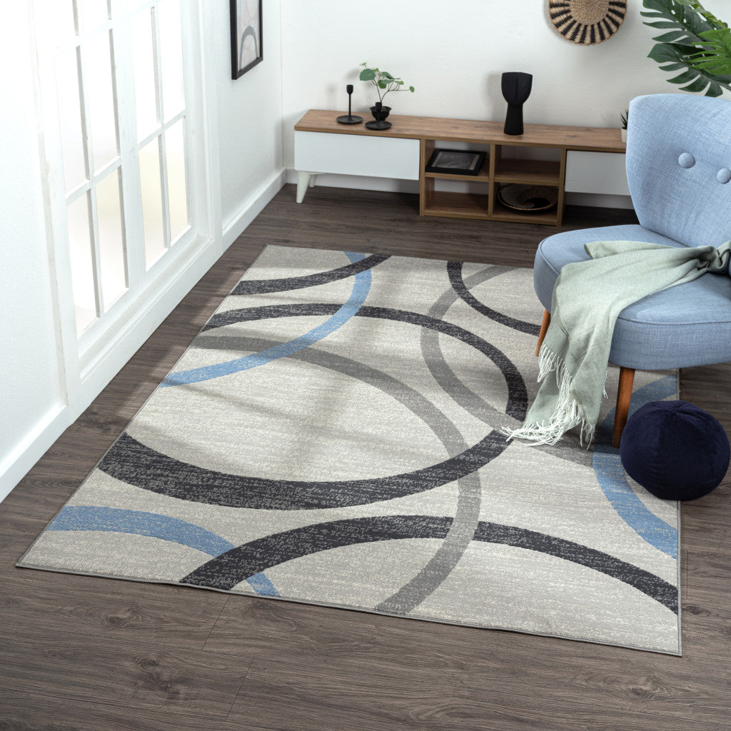 5' X 7' Ivory Blue and Gray Geometric Area Rug