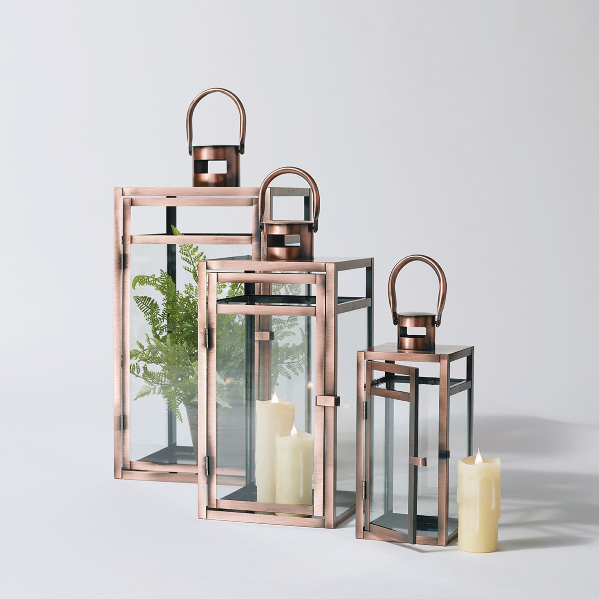 Set Of Three Copper Flameless Floor Lantern Candle Holder