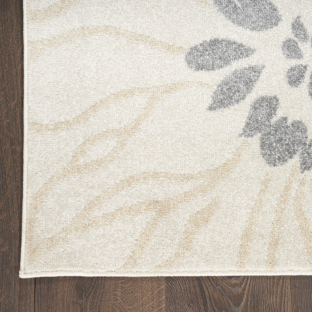 2' X 3' Cream Floral Power Loom Distressed Area Rug