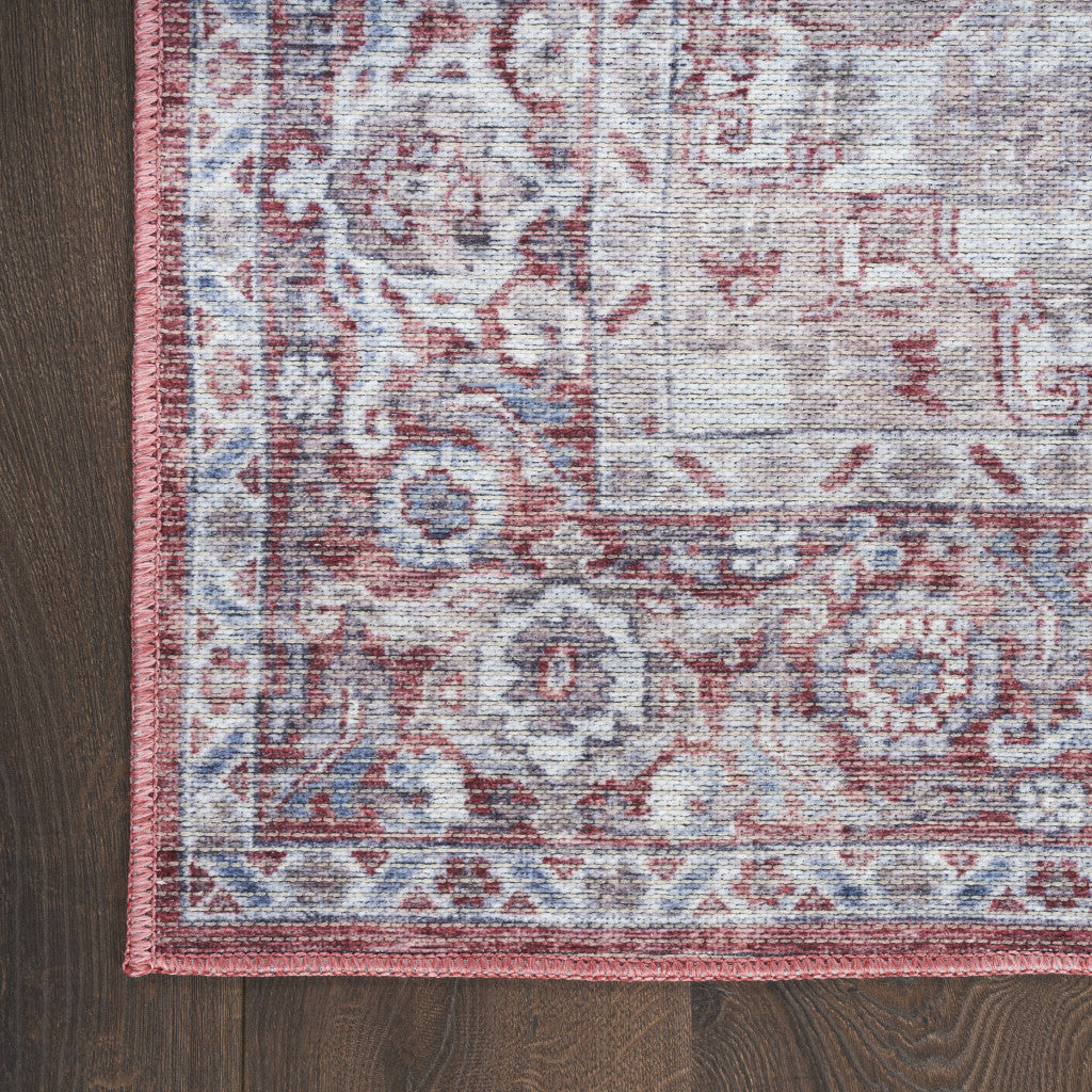 6' X 9' Blue And Pink Floral Power Loom Distressed Washable Area Rug