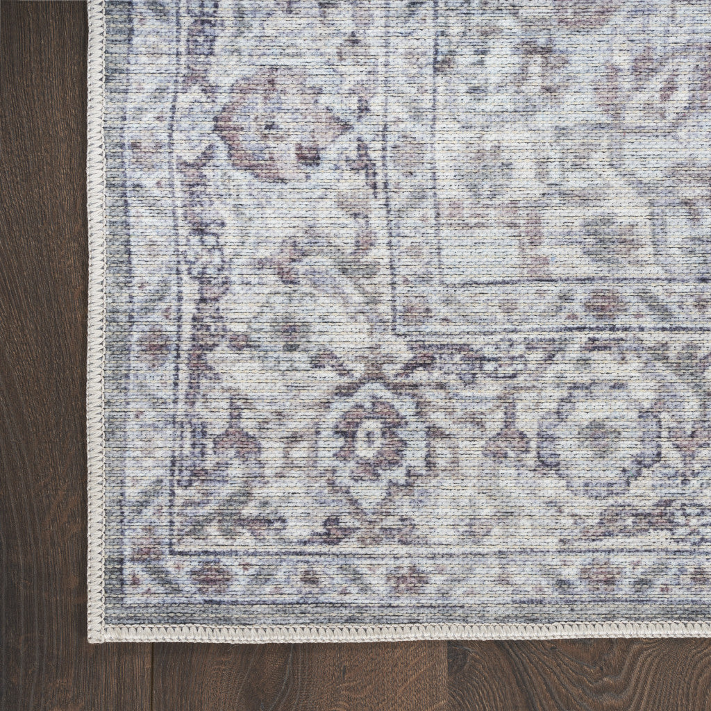 5' X 7' Blue And Pink Floral Power Loom Distressed Washable Area Rug