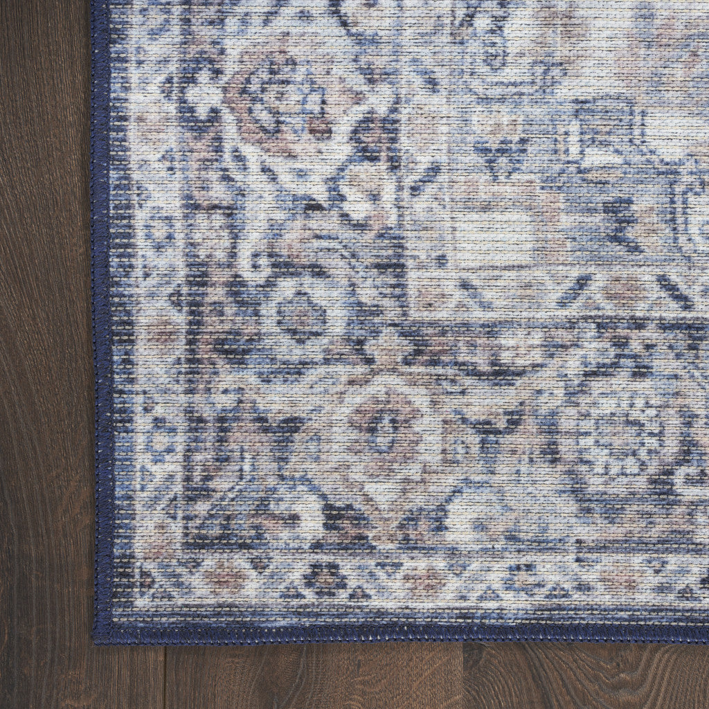 8' Blue and Ivory Floral Power Loom Distressed Washable Runner Rug