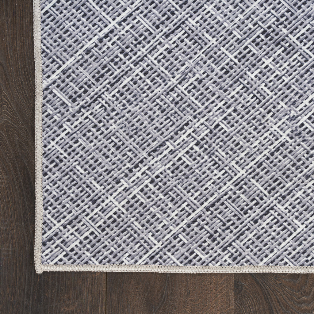 6' x 9' Gray and Ivory Abstract Power Loom Washable Non Skid Area Rug