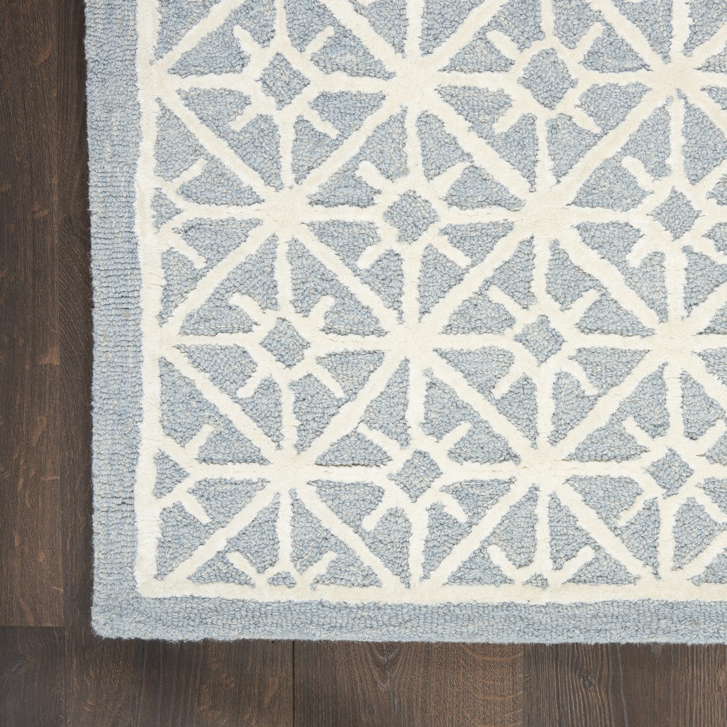 4' x 6' Light Blue and White Geometric Hand Tufted Area Rug