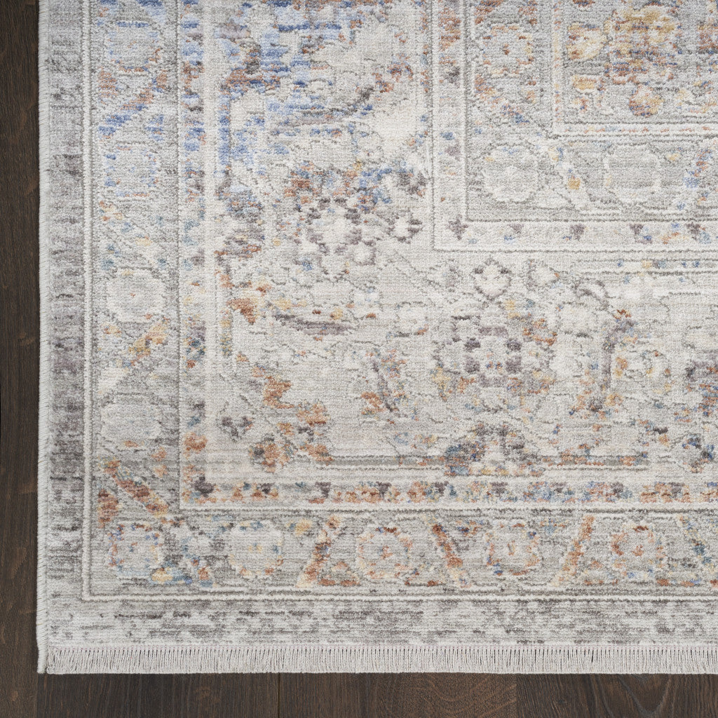 8' x 10' Ivory and Blue Oriental Power Loom Distressed Area Rug With Fringe