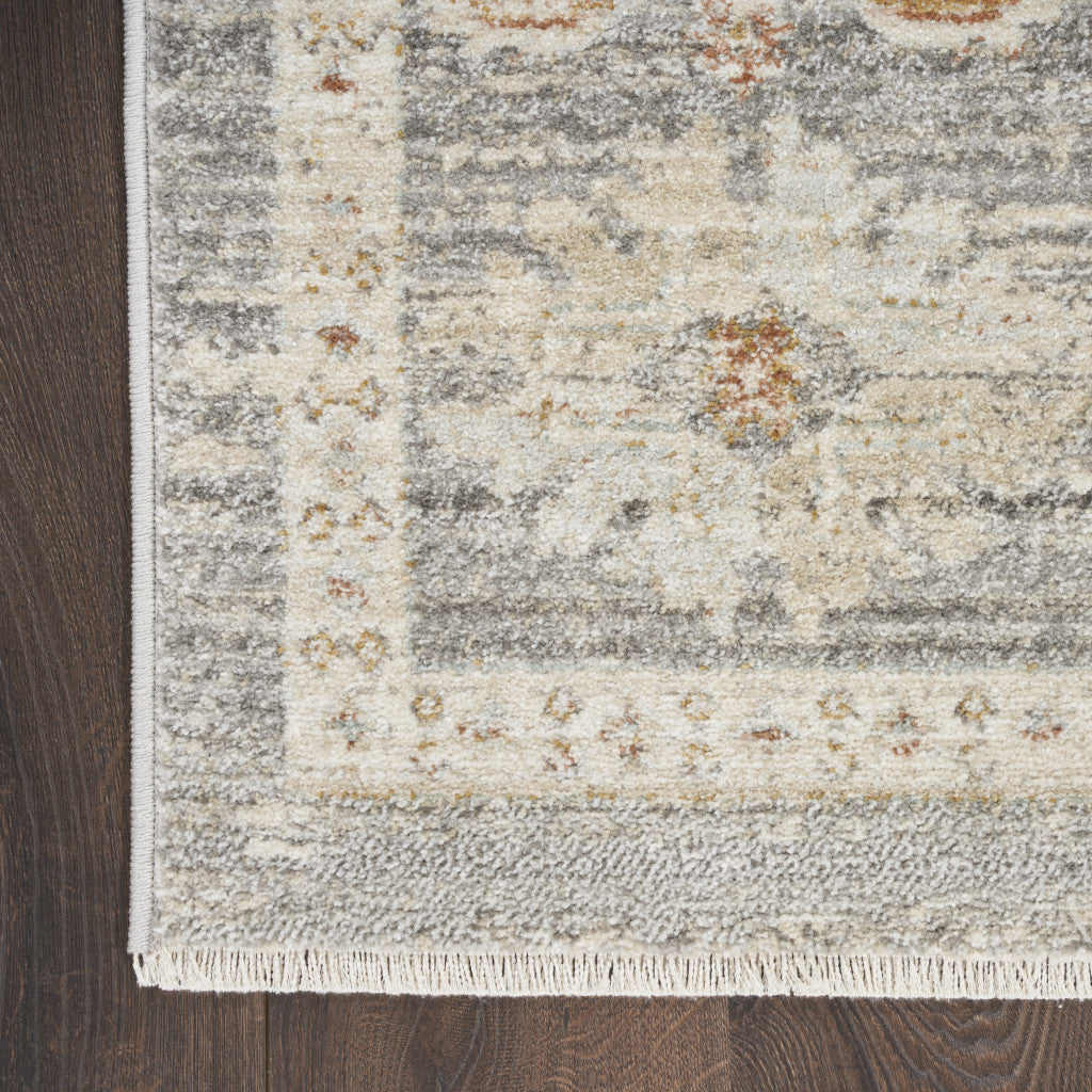 8' x 10' Beige Ivory and Gray Oriental Power Loom Distressed Area Rug With Fringe