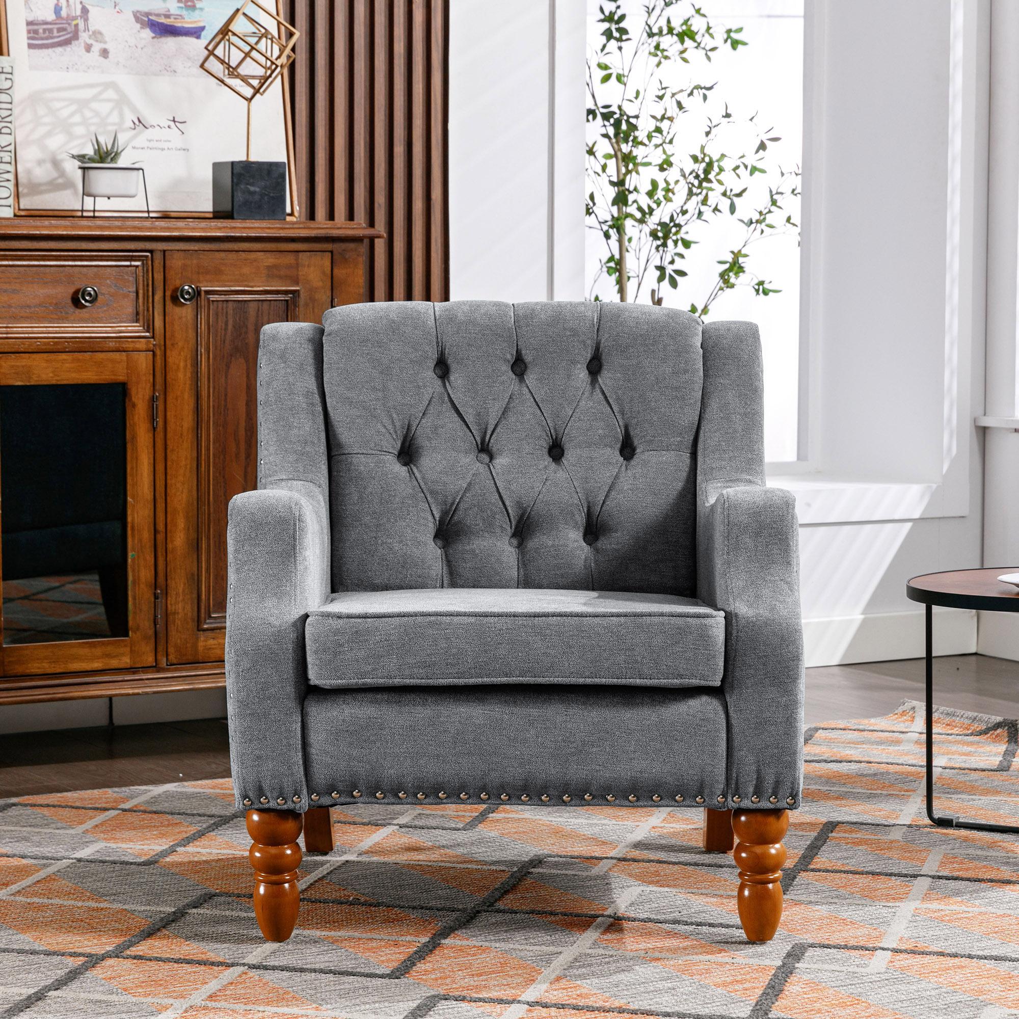 Footstool chair sets with vintage brass studs, button tufted upholstered armchairs, and comfortable reading chairs make a variety of environments