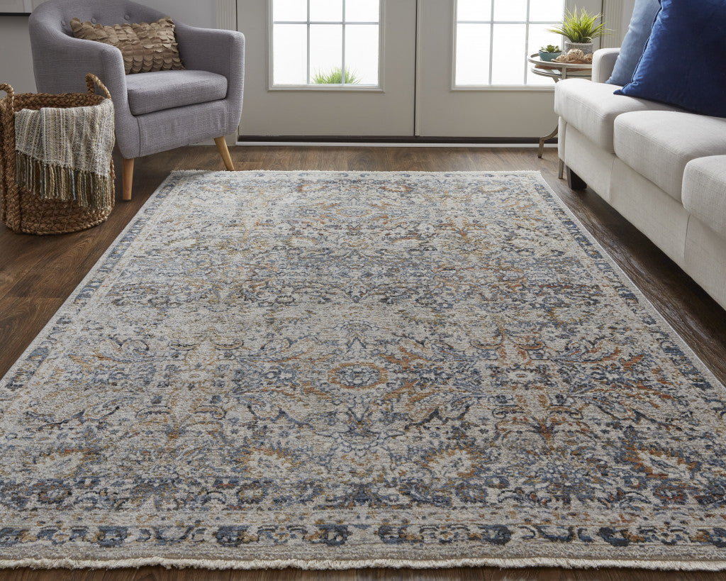 8' Tan Blue And Orange Floral Power Loom Distressed Runner Rug With Fringe