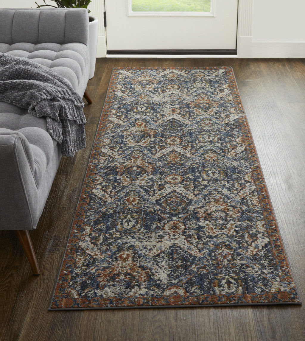 8' X 10' Blue Orange And Ivory Floral Power Loom Area Rug With Fringe