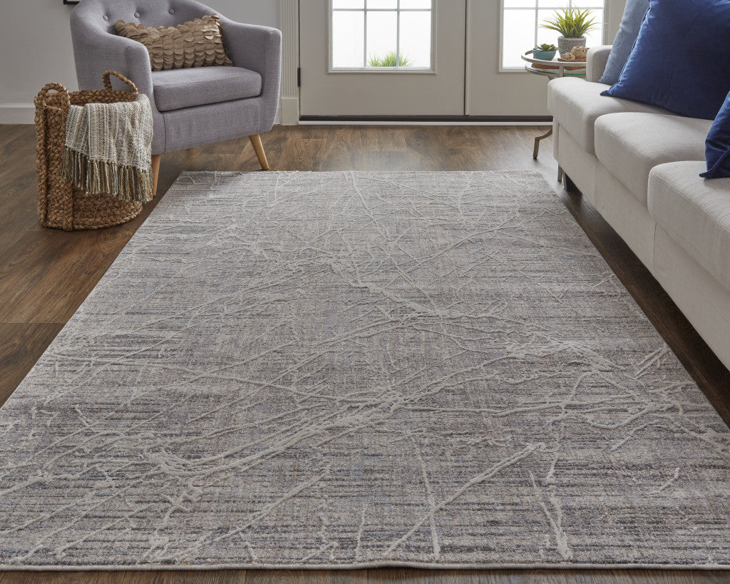 5' X 8' Taupe And Gray Abstract Power Loom Distressed Stain Resistant Area Rug