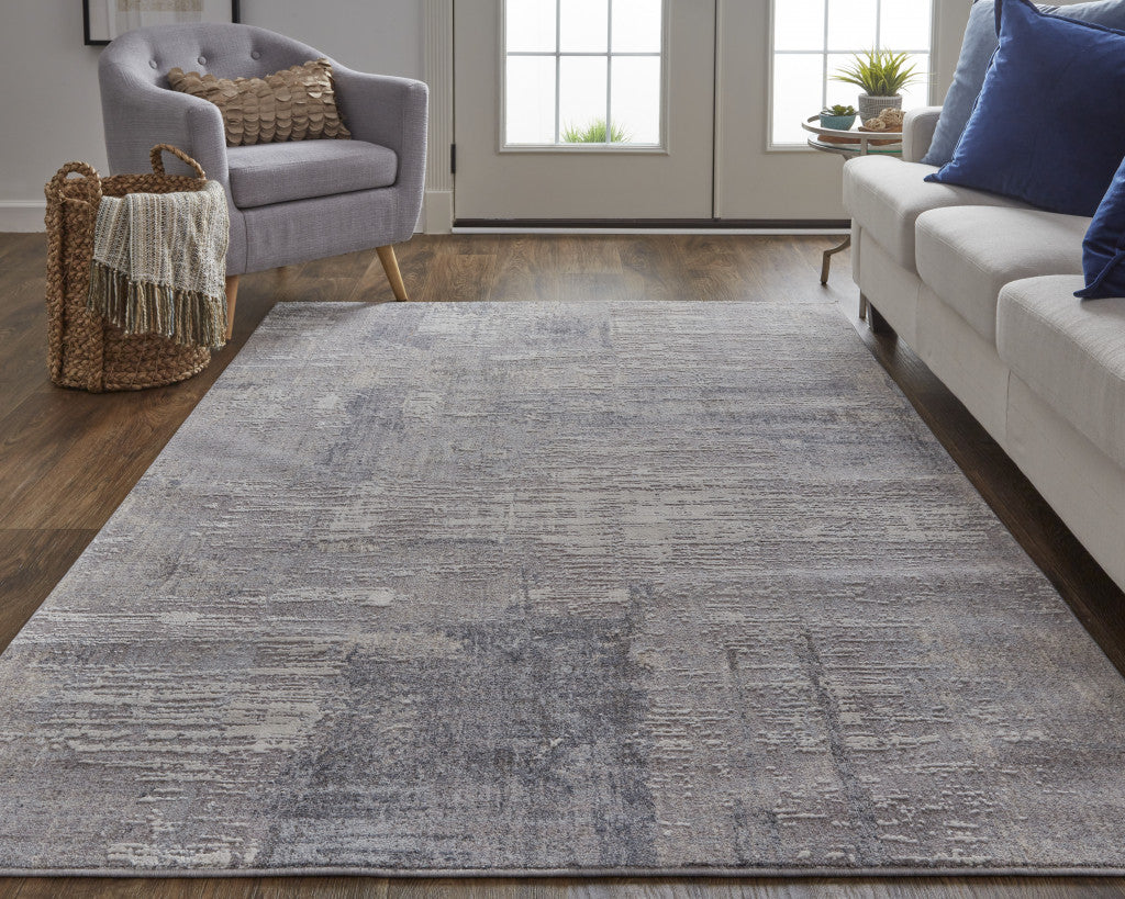 9' X 12' Taupe Tan And Blue Abstract Power Loom Distressed Stain Resistant Area Rug